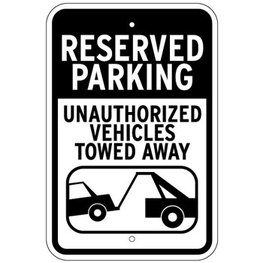unauthorized vehicle towing sign